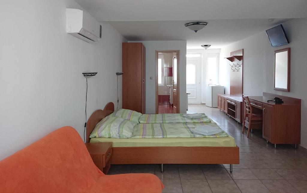 Postel nebo postele na pokoji v ubytování Rider Beach