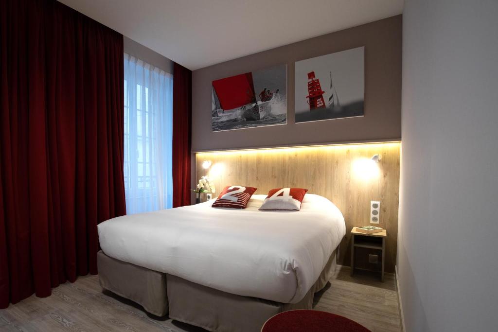 Hôtel des Marins, Saint-Malo客房内的一张或多张床位