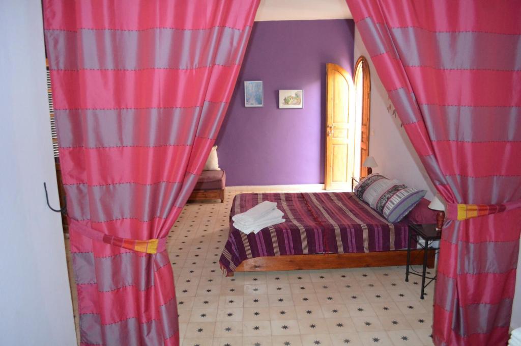 Postel nebo postele na pokoji v ubytování Casa Naima