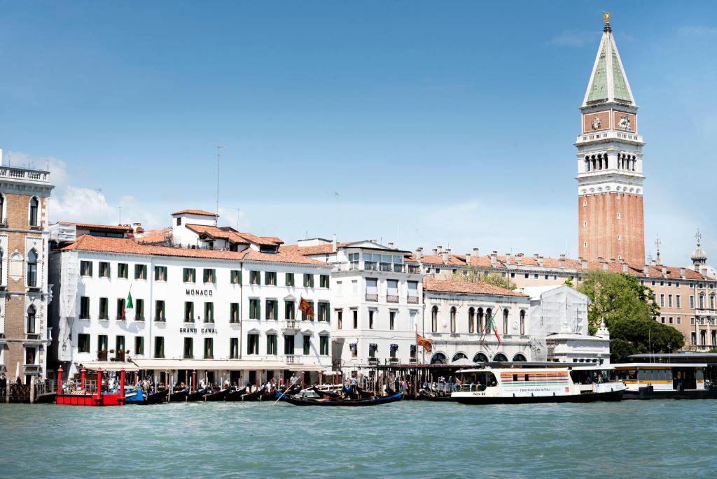 a view of a city with boats in the water at Monaco &amp; Grand Canal in Venice