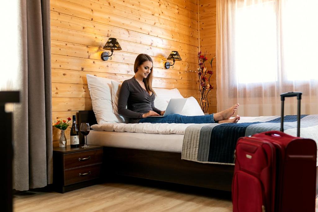 Postel nebo postele na pokoji v ubytování Barrico Thermal Hotel
