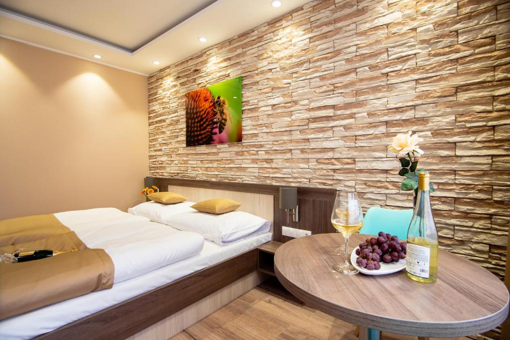 Voodi või voodid majutusasutuse Hotel Viktor toas