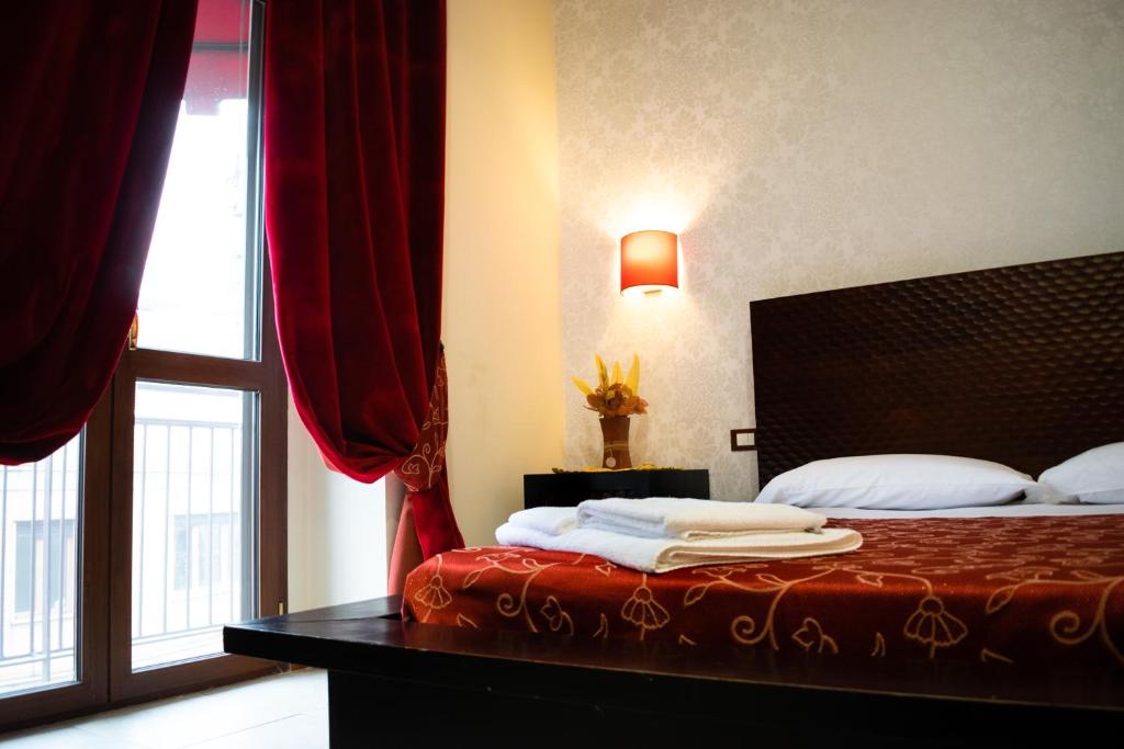 Postel nebo postele na pokoji v ubytování B&B Muro Torto Lucera