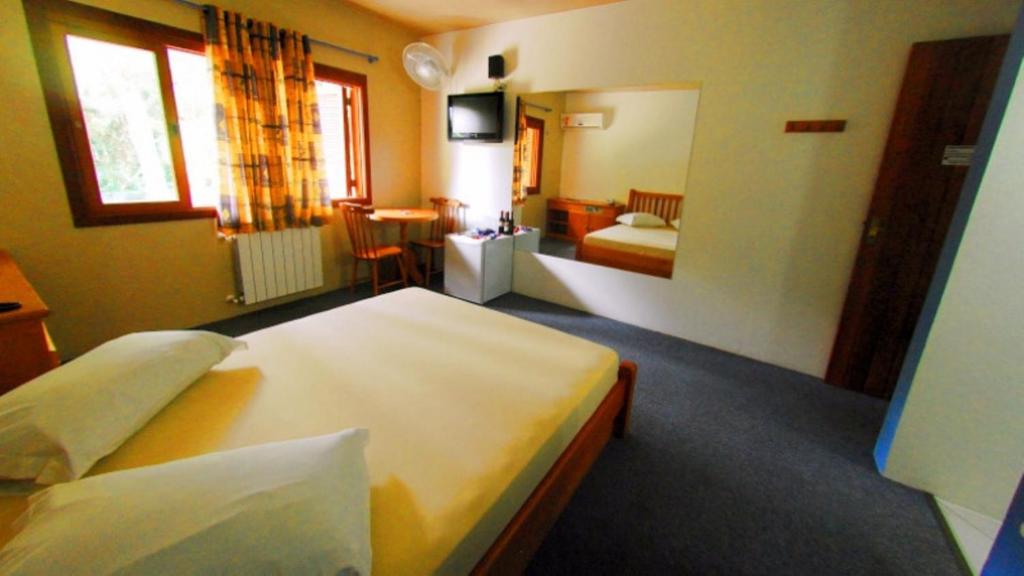 Postel nebo postele na pokoji v ubytování Motel Tentação (Adult Only)