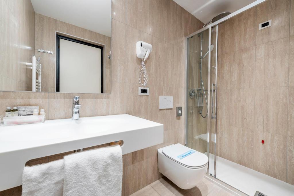 Koupelna v ubytování Hotel Asnigo