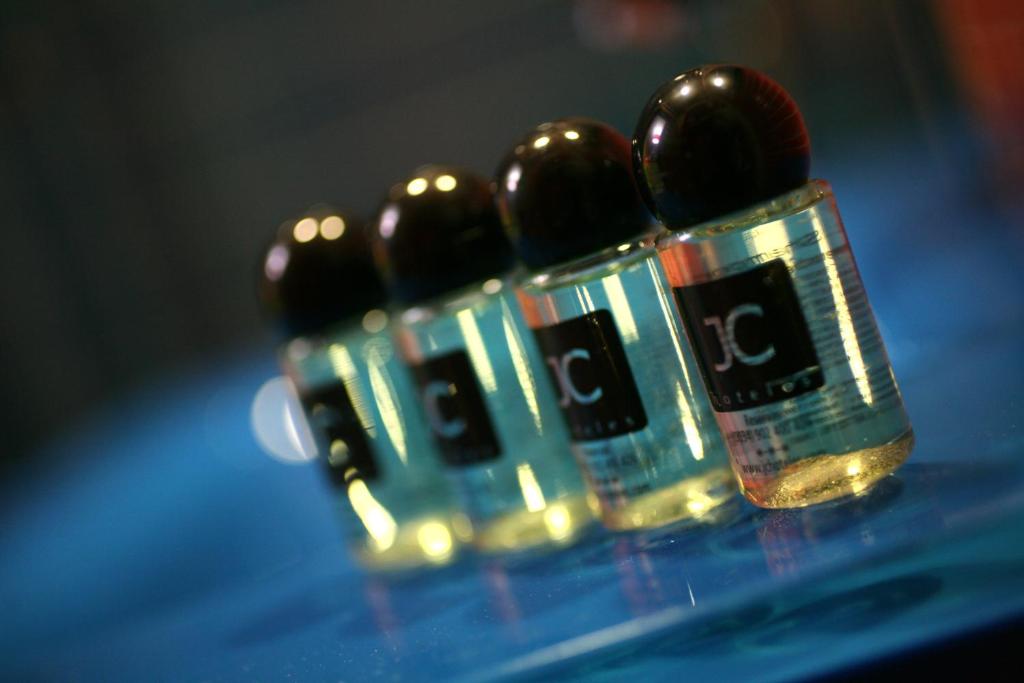 a group of batteries sitting on top of a table at JC Rooms Santo Domingo in Madrid