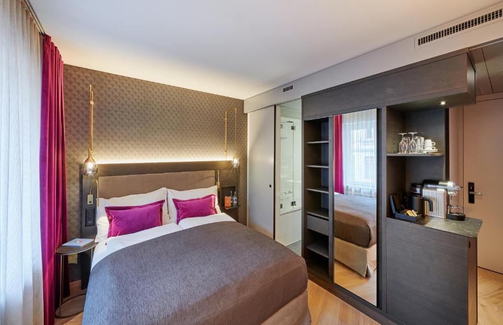 Postel nebo postele na pokoji v ubytování Boutique Hotel Seefeld