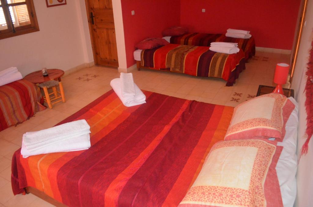 Postel nebo postele na pokoji v ubytování Casa Naima