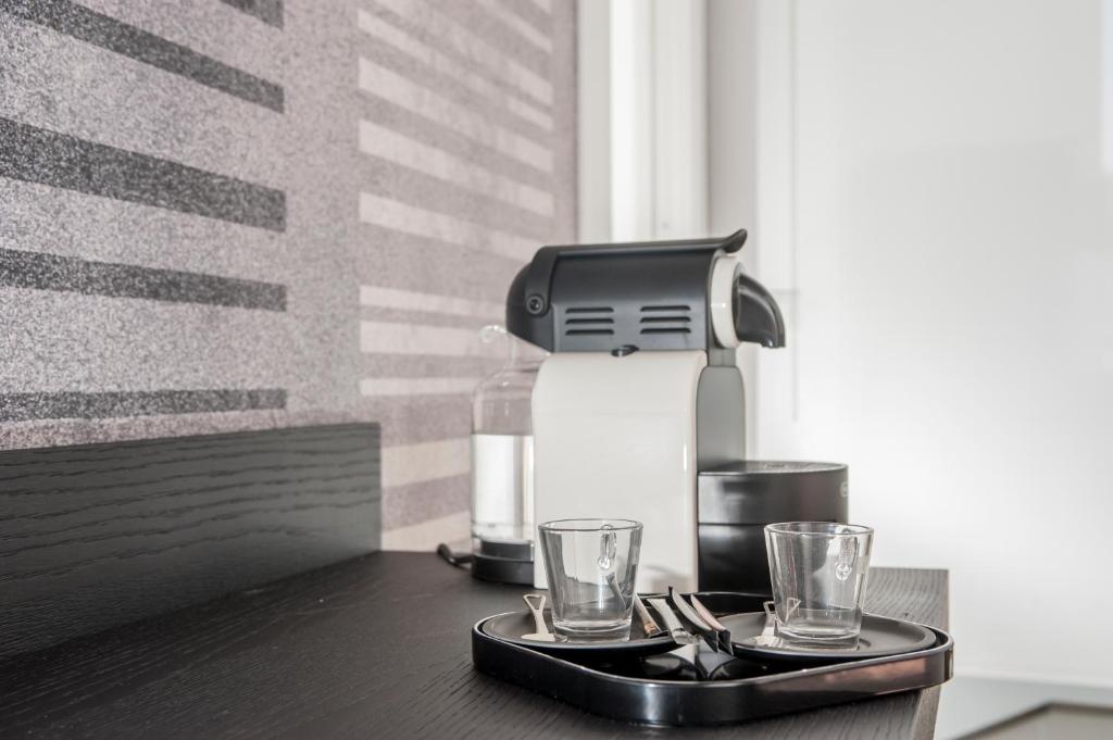 Příslušenství pro přípravu čaje a kávy v ubytování B&B First Floor