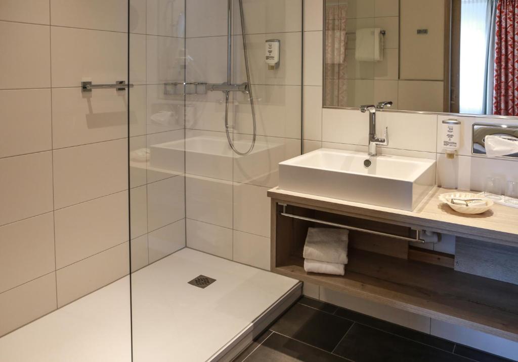 Koupelna v ubytování Rüters Parkhotel