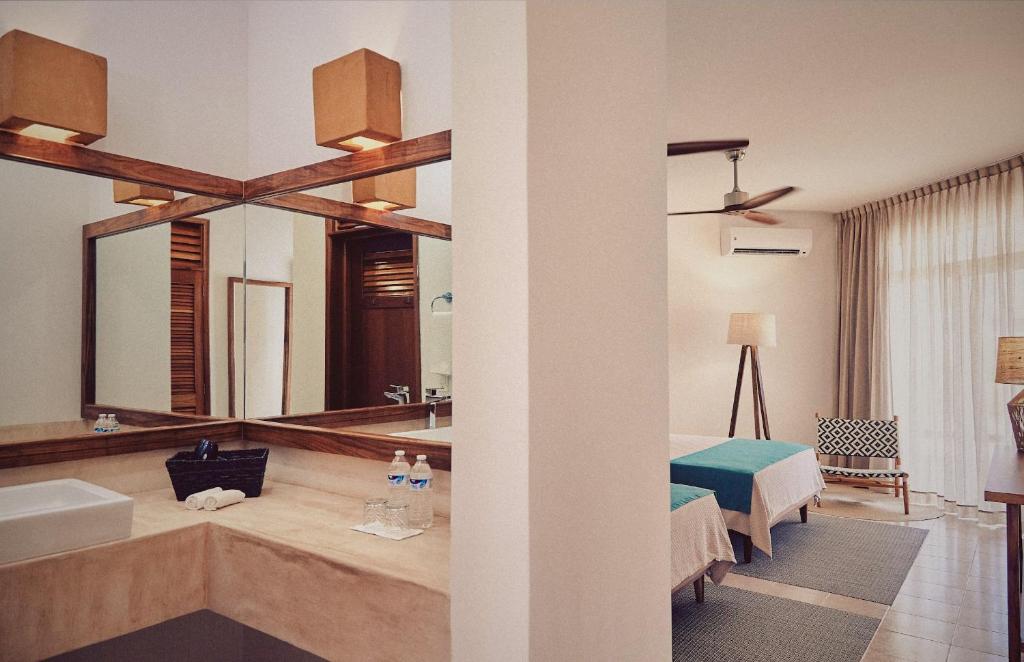 Postel nebo postele na pokoji v ubytování Casa Altamar