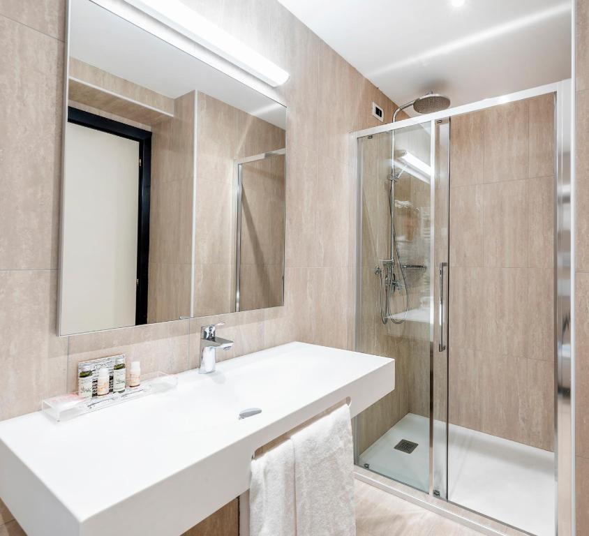 Koupelna v ubytování Hotel Asnigo