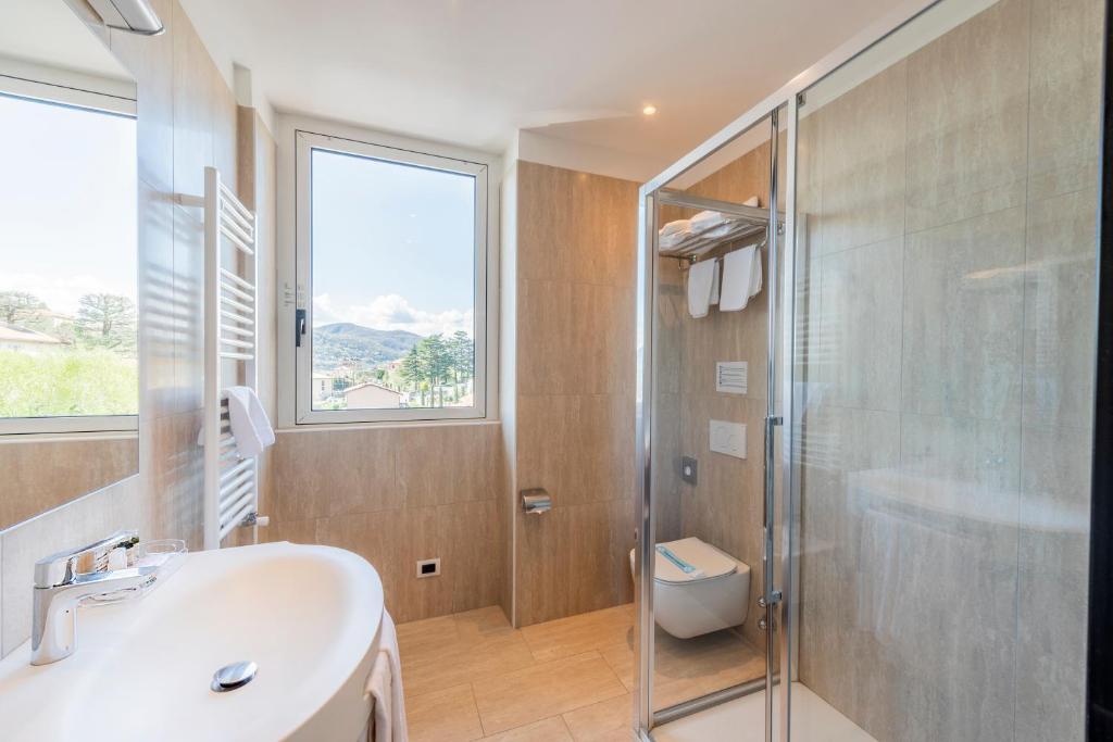 Koupelna v ubytování Hotel Asnigo