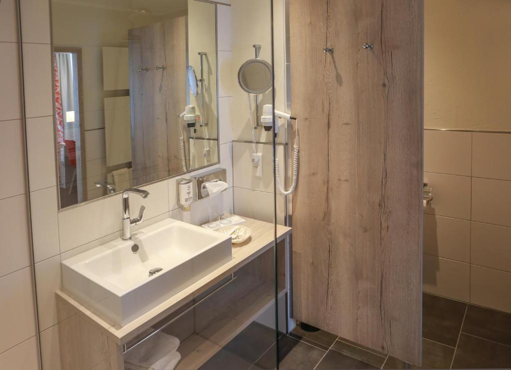 Koupelna v ubytování Rüters Parkhotel