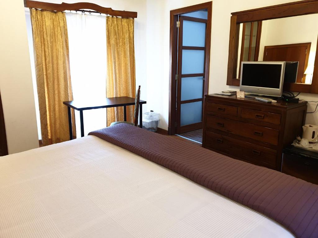 Postel nebo postele na pokoji v ubytování Hotel Segles - Turismo de Interior
