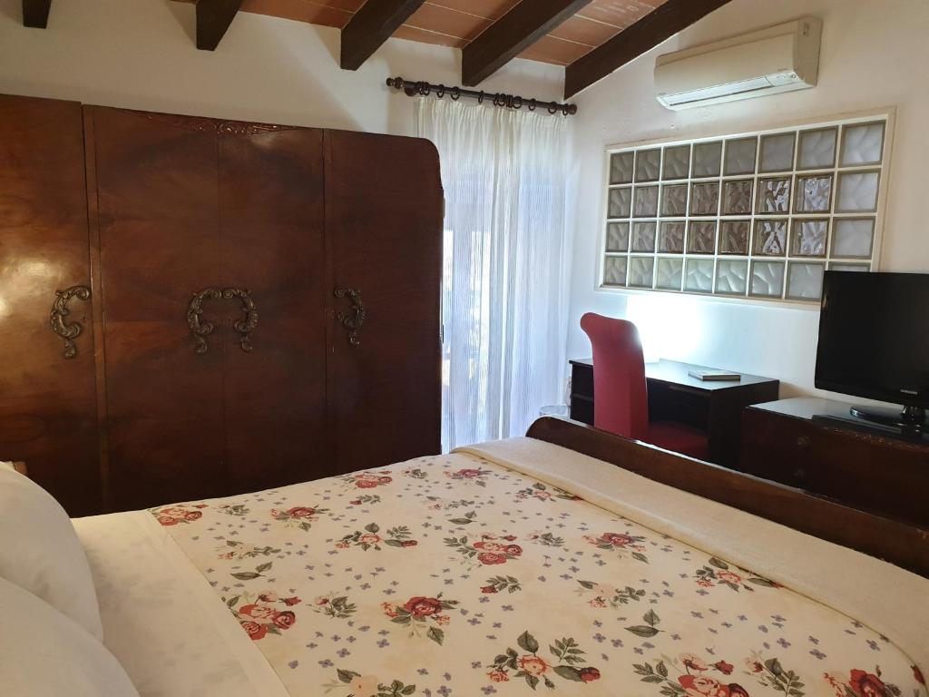Postel nebo postele na pokoji v ubytování Hotel Segles - Turismo de Interior