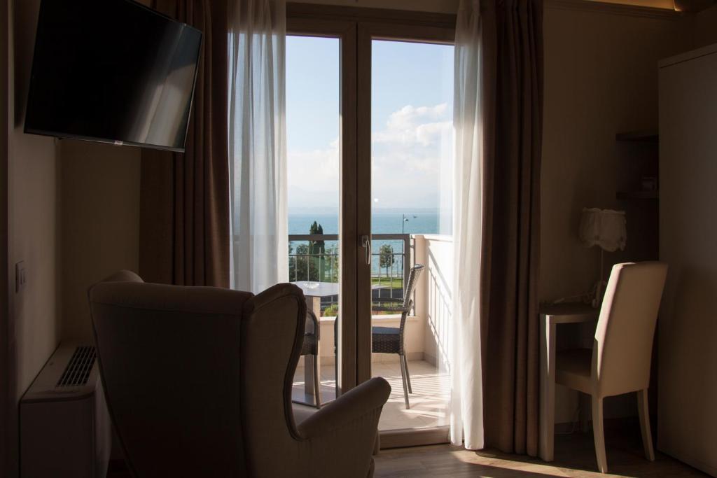 TV a/nebo společenská místnost v ubytování Hotel Berta