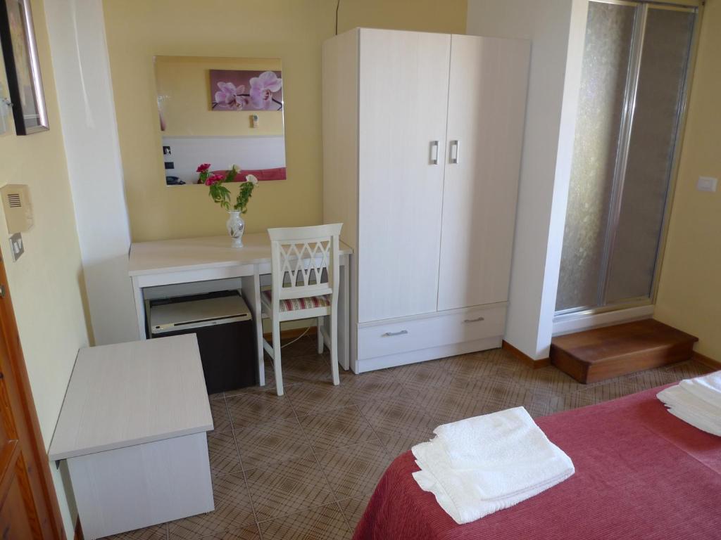Postel nebo postele na pokoji v ubytování Hotel Alexander