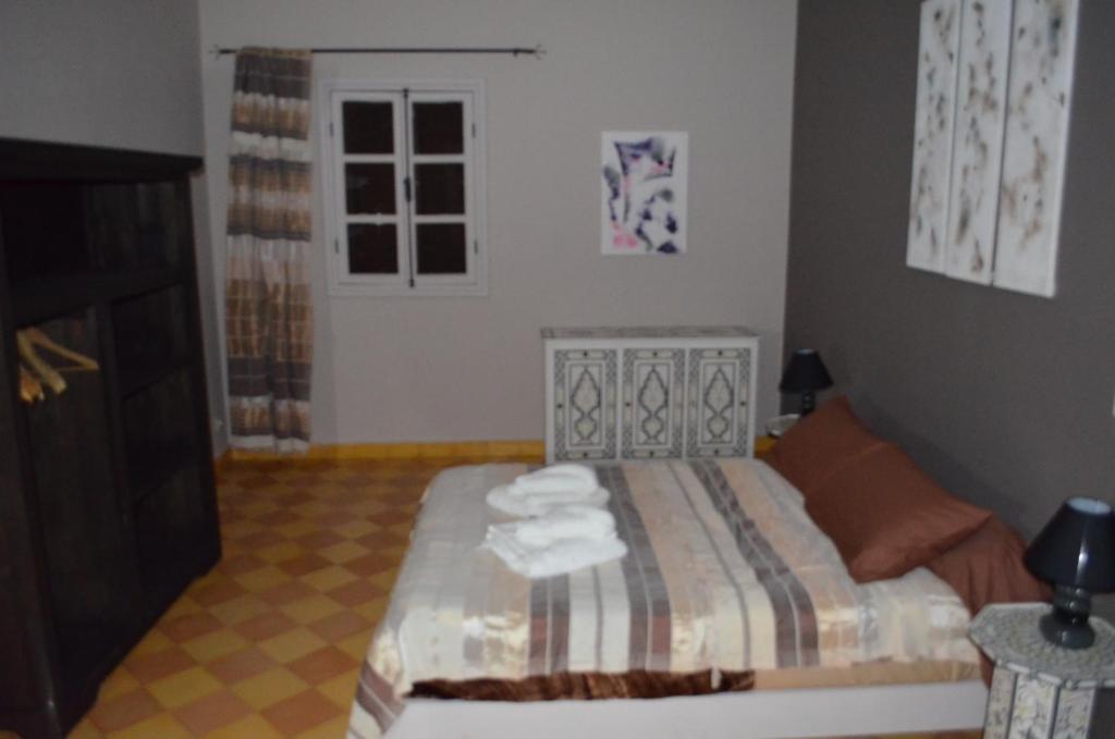 Postel nebo postele na pokoji v ubytování Casa Naima