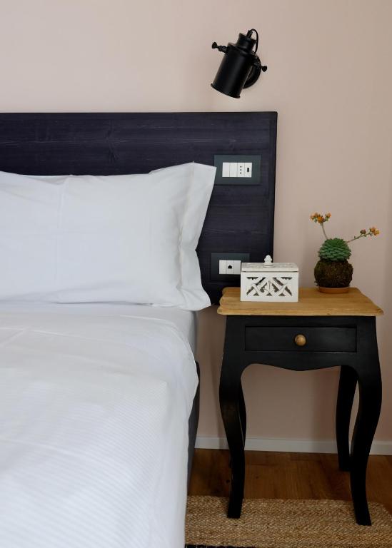 Postel nebo postele na pokoji v ubytování Casa della Capra