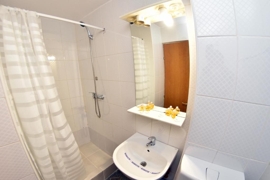Koupelna v ubytování Hotel Victoria