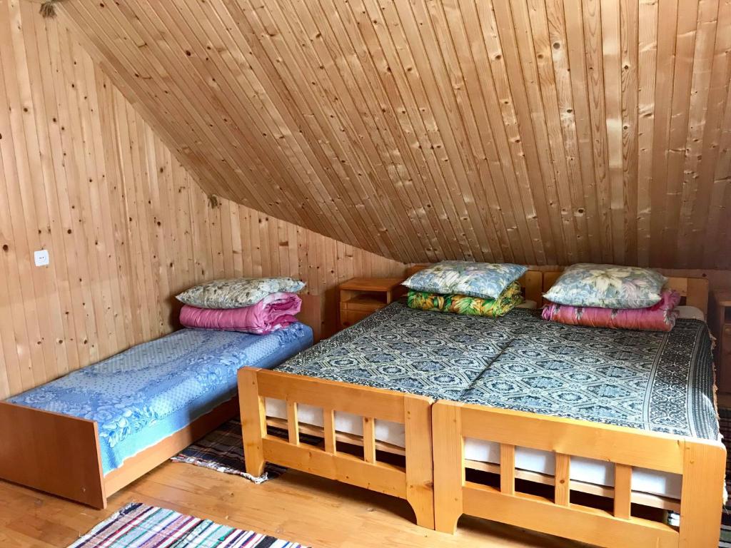 Postel nebo postele na pokoji v ubytování Rukavichka
