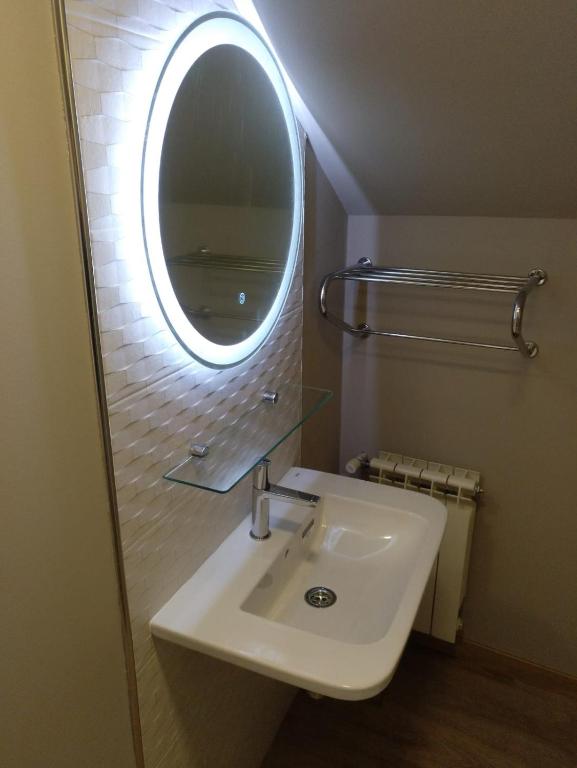 A bathroom at Travesia Rooms