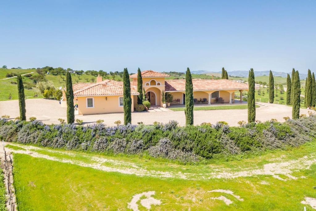 an aerial view of a villa with a garden at Aterno Estate & Vineyard, Main House & Guest House in Templeton