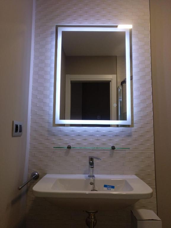 A bathroom at Travesia Rooms