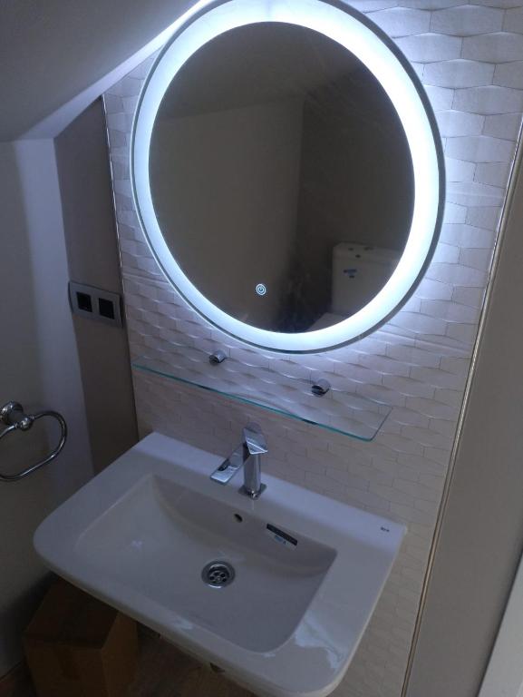 A bathroom at Travesia Rooms