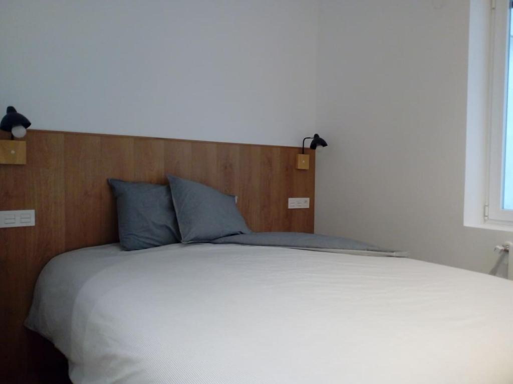 Posteľ alebo postele v izbe v ubytovaní Apartamento Donostia Chic