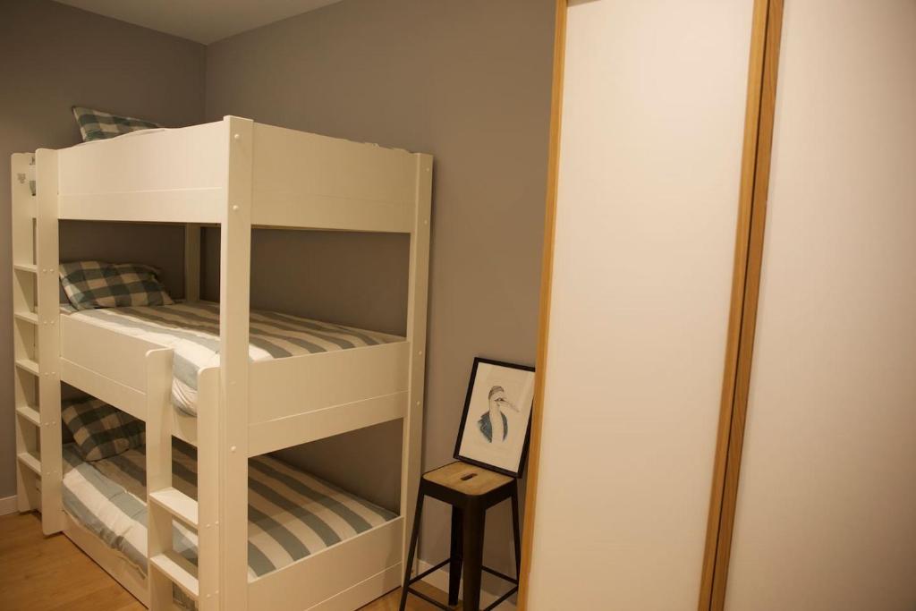Posteľ alebo postele v izbe v ubytovaní Apartamento Donostia Chic