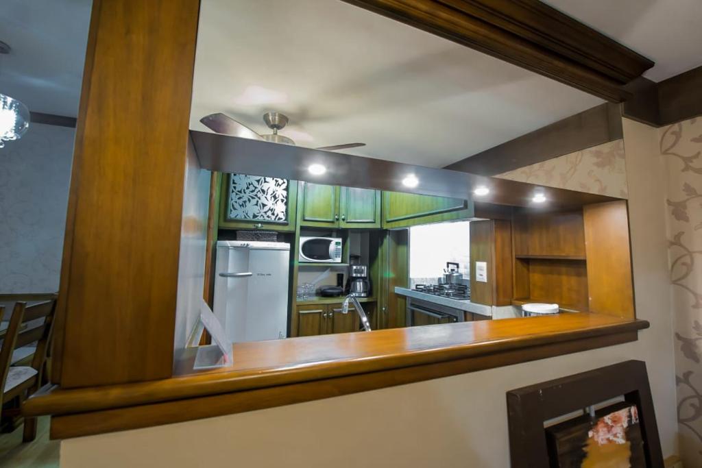 Kuchyň nebo kuchyňský kout v ubytování Flat no Hotel Wish Serrano Resort