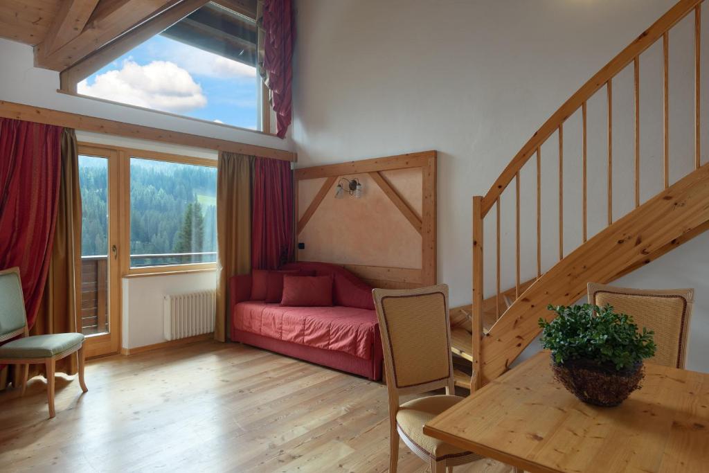 Postel nebo postele na pokoji v ubytování Carlo Magno Hotel Spa Resort