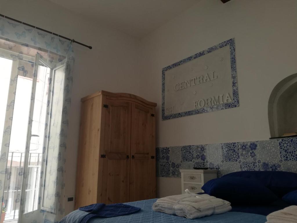Postel nebo postele na pokoji v ubytování Central GH Formia