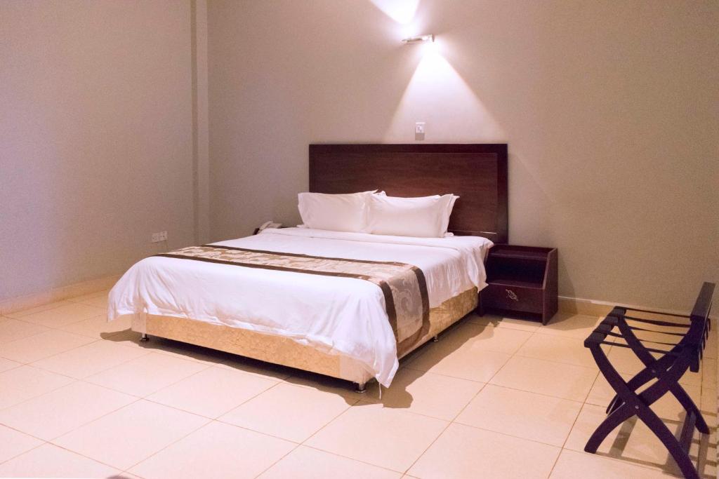 Postel nebo postele na pokoji v ubytování Easy View Hotel Mbarara