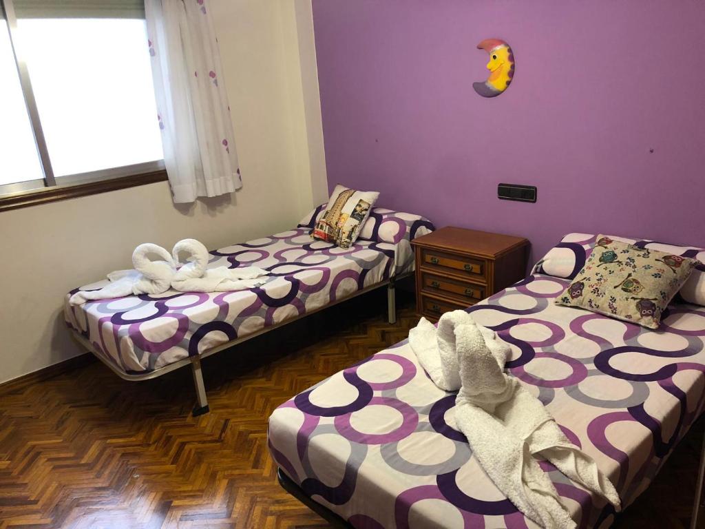Postel nebo postele na pokoji v ubytování Piso Ourense Bonito y Termal