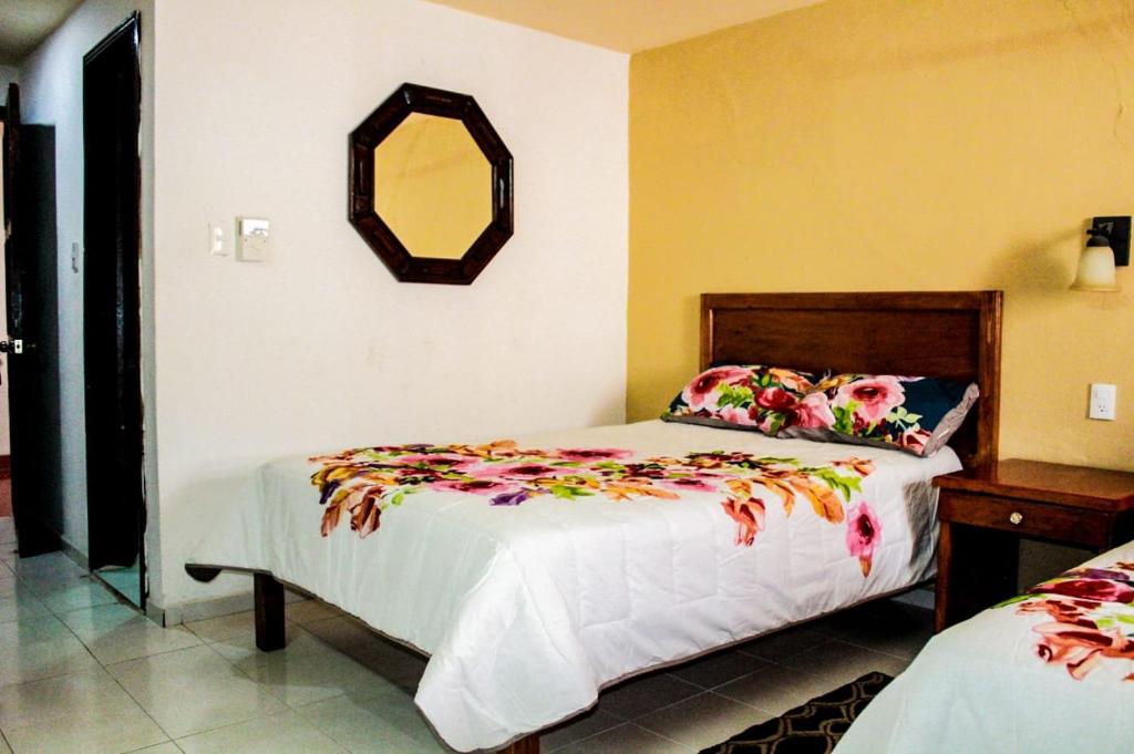 Postel nebo postele na pokoji v ubytování Hotel San Clemente