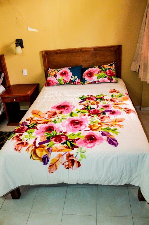Postel nebo postele na pokoji v ubytování Hotel San Clemente