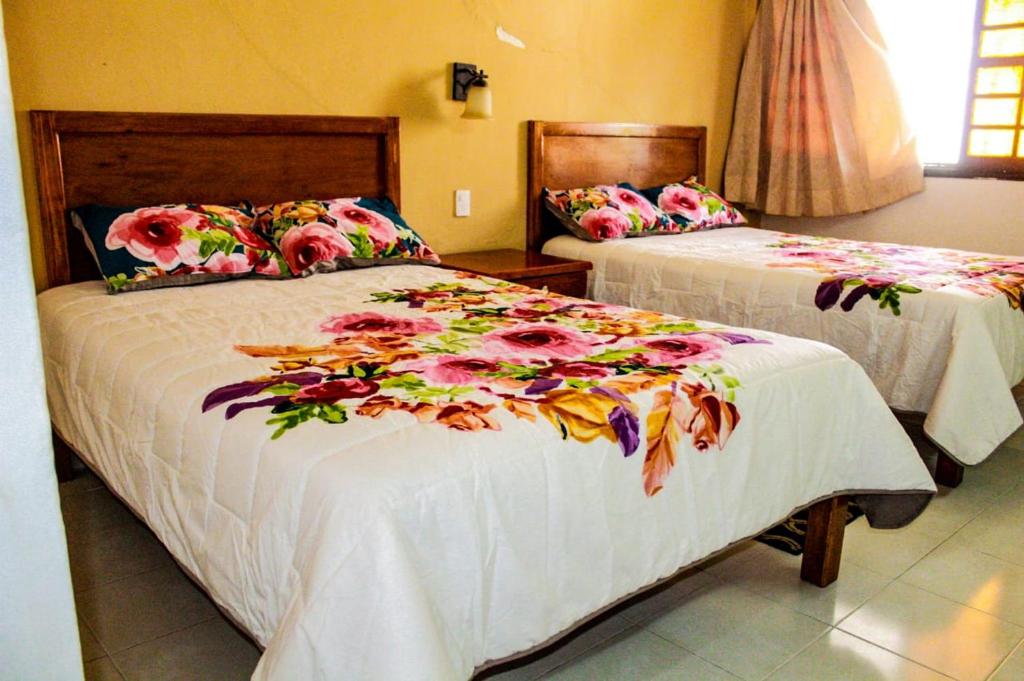 Postel nebo postele na pokoji v ubytování Hotel San Clemente