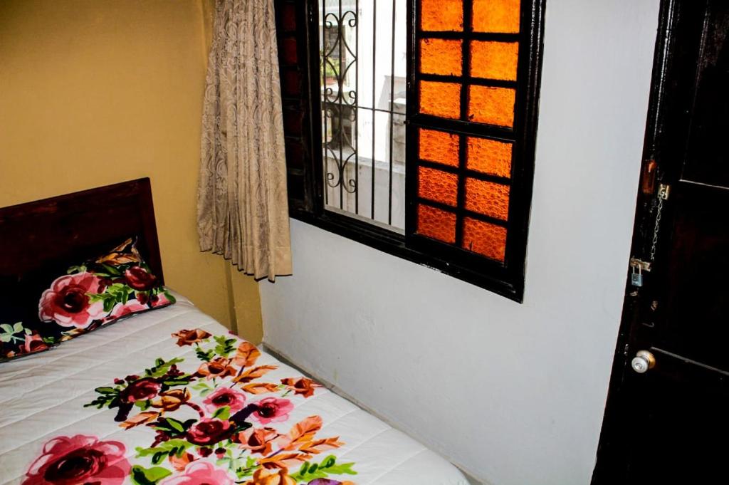 Postel nebo postele na pokoji v ubytování Hotel San Clemente