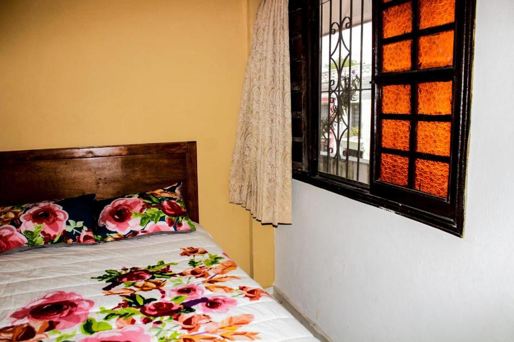 Postel nebo postele na pokoji v ubytování Hotel San Clemente