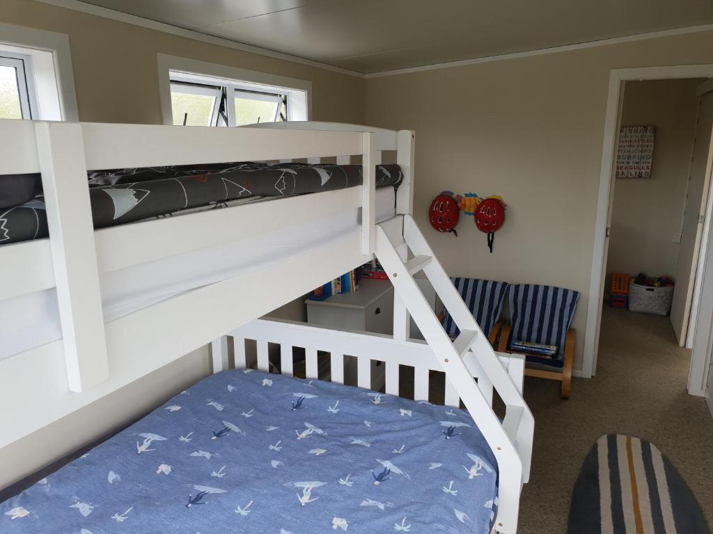 Postel nebo postele na pokoji v ubytování Stanmore Bay Beach House