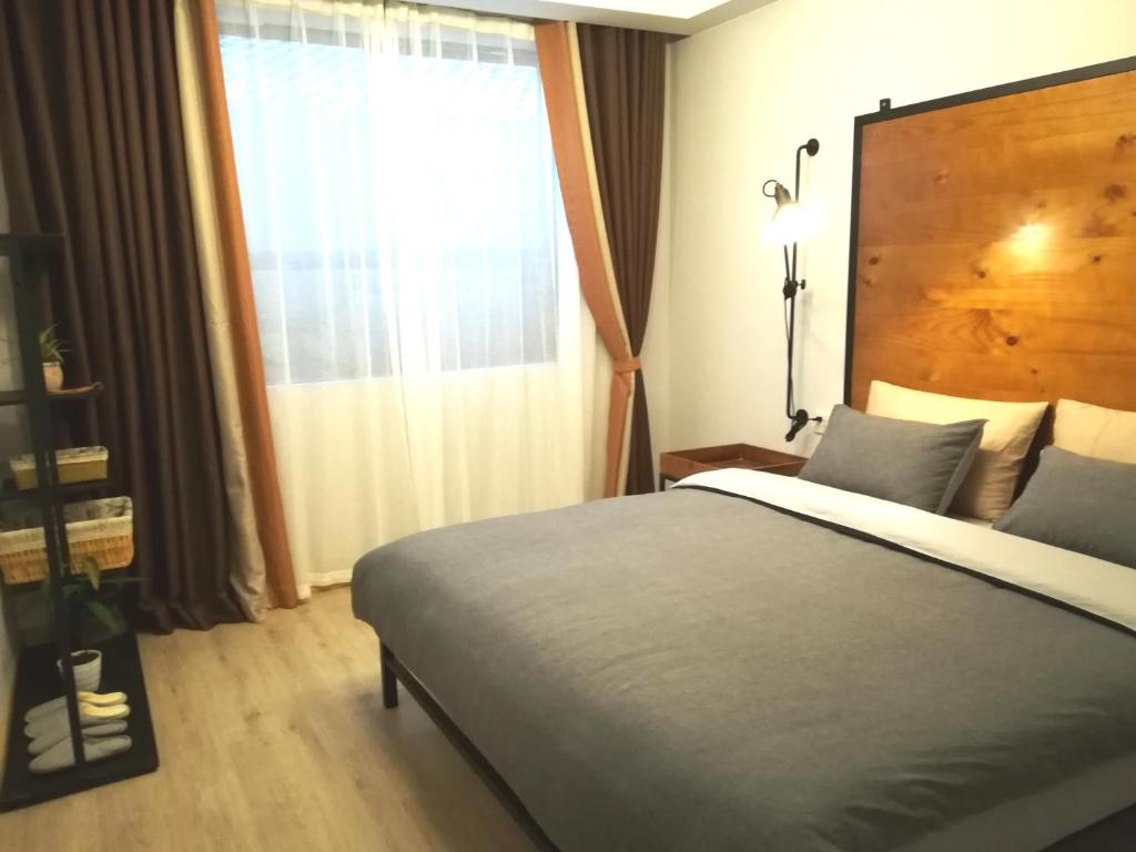 Postel nebo postele na pokoji v ubytování A&G Apartment