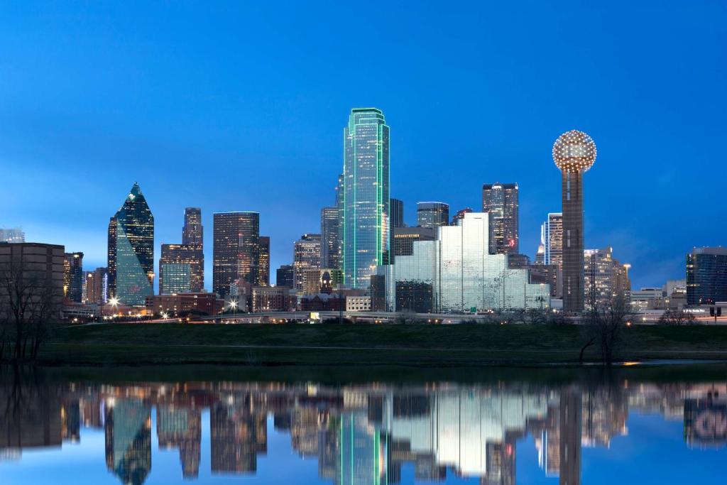a view of a city skyline at night at Hyatt Regency Dallas in Dallas