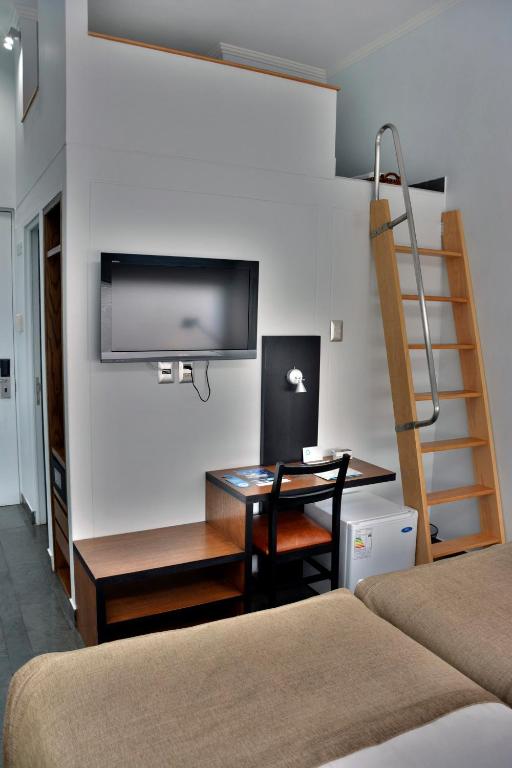 TV a/nebo společenská místnost v ubytování Natalino Hotel Patagonia