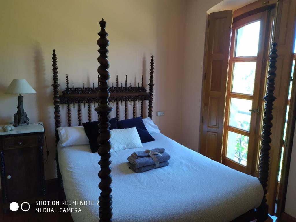 Postel nebo postele na pokoji v ubytování Palacete Peñanora