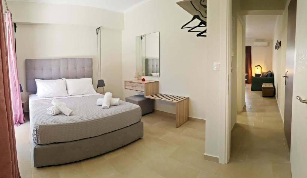 Posteľ alebo postele v izbe v ubytovaní CELENI APARTMENTS