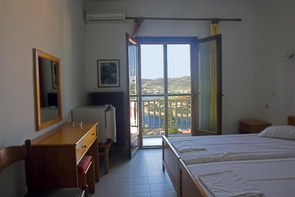 Ένα ή περισσότερα κρεβάτια σε δωμάτιο στο Art Hotel Panorama