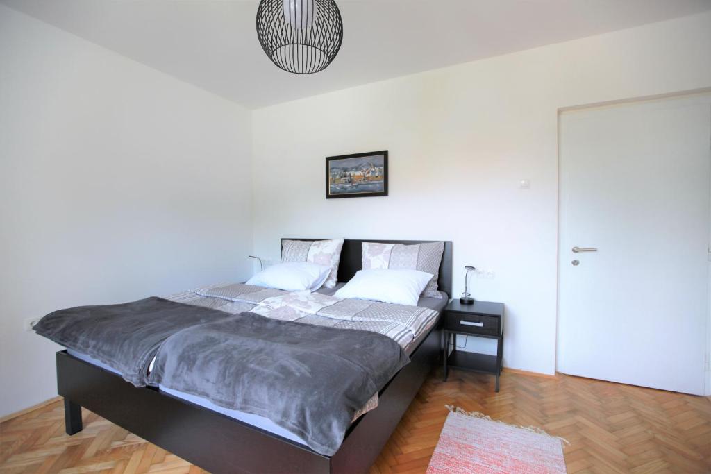 Postel nebo postele na pokoji v ubytování Apartment Gondola